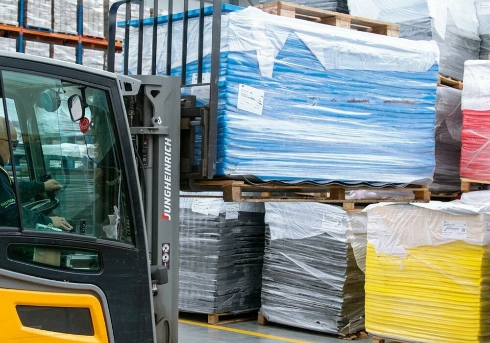 Foam materials A forklift moving foam materials in a warehouse